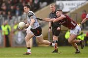 18 February 2024; Tyrone goalkeeper Niall Morgan in action against Seán Mulkerrin of Galway during the Allianz Football League Division 1 match between Tyrone and Galway at O'Neills Healy Park in Omagh, Tyrone. Photo by Ramsey Cardy/Sportsfile