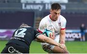 18 February 2024; Mike Lowry of Ulster is tackled by Keiran Williams of Ospreys during the United Rugby Championship match between Ospreys and Ulster at Swansea.com Stadium in Swansea, Wales. Photo by Gareth Everett/Sportsfile
