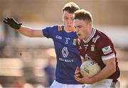 18 February 2024; Conor Dillon of Westmeath is tackled by Matt Nolan of Wicklow during the Allianz Football League Division 3 match between Wicklow and Westmeath at Echelon Park in Aughrim, Wicklow. Photo by Ray McManus/Sportsfile
