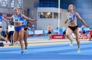 18 February 2024; Molly Scott of St Laurence O'Toole AC, Dublin, left, crosses the finish line ahead of Mollie O'Reilly of Dundrum South Dublin AC, Dublin, to win the senior women's 60m during day two of the 123.ie National Senior Indoor Championships at the Sport Ireland National Indoor Arena in Dublin. Photo by Tyler Miller/Sportsfile