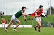 18 February 2024; Conor Early of Louth in action against Donal Keogan of Meath during the Allianz Football League Division 2 match between Meath and Louth at Páirc Tailteann in Navan, Meath. Photo by Shauna Clinton/Sportsfile