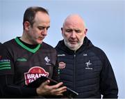 18 February 2024; Kildare manager Glenn Ryan with selector Brian Lacey, left, as they make their way off the pitch at half-time during the Allianz Football League Division 2 match between Kildare and Armagh at Netwatch Cullen Park in Carlow. Photo by Piaras Ó Mídheach/Sportsfile