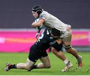 18 February 2024; Marcus Rea of Ulster is tackled by Alex Cuthbert of Ospreys during the United Rugby Championship match between Ospreys and Ulster at Swansea.com Stadium in Swansea, Wales. Photo by Chris Fairweather/Sportsfile