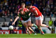 18 February 2024; Cian McBride of Meath in action against Paul Mathews, left, and Tommy Durnin of Louth during the Allianz Football League Division 2 match between Meath and Louth at Páirc Tailteann in Navan, Meath. Photo by Shauna Clinton/Sportsfile
