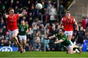 18 February 2024; Cathal Hickey of Meath in action against Donal McKenny, left, and Ryan Burns of Louth during the Allianz Football League Division 2 match between Meath and Louth at Páirc Tailteann in Navan, Meath. Photo by Shauna Clinton/Sportsfile