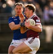 18 February 2024; Jonathan Lynam of Westmeath is tackled by Dean Healy of Wicklow during the Allianz Football League Division 3 match between Wicklow and Westmeath at Echelon Park in Aughrim, Wicklow. Photo by Ray McManus/Sportsfile