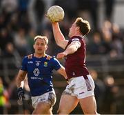 18 February 2024; Jonathan Lynam of Westmeath is tackled by Dean Healy of Wicklow during the Allianz Football League Division 3 match between Wicklow and Westmeath at Echelon Park in Aughrim, Wicklow. Photo by Ray McManus/Sportsfile