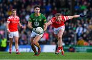 18 February 2024; Ciaran Caulfield of Meath in action against Ryan Burns of Louth during the Allianz Football League Division 2 match between Meath and Louth at Páirc Tailteann in Navan, Meath. Photo by Shauna Clinton/Sportsfile