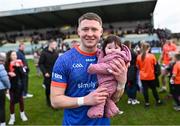 18 February 2024; Armagh goalkeeper Blaine Hughes with his daughter Mallaidh Hughes, age 4 months, after his side's victory in the Allianz Football League Division 2 match between Kildare and Armagh at Netwatch Cullen Park in Carlow. Photo by Piaras Ó Mídheach/Sportsfile