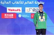 18 February 2024; Daniel Wiffen of Ireland with his gold medal after winning the Men's 1500m freestyle final during day eight of the World Aquatics Championships 2024 at the Aspire Dome in Doha, Qatar. Photo by Ian MacNicol/Sportsfile