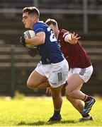 18 February 2024; Eóin Darcy of Wicklow is tackled by Jamie Gonould of Westmeath during the Allianz Football League Division 3 match between Wicklow and Westmeath at Echelon Park in Aughrim, Wicklow. Photo by Ray McManus/Sportsfile
