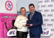 17 February 2024; Pictured at the Learn to Lead LGFA Female Leadership Programme graduation ceremony at The Bonnington Hotel in Dublin was Paula Sands, from Saul, Co Down, with Ladies Gaelic Football Association President, Mícheál Naughton. The Learn to Lead programme was devised to develop the next generation of leaders within Ladies Gaelic Football. Photo by Matt Browne/Sportsfile