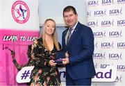 17 February 2024; Pictured at the Learn to Lead LGFA Female Leadership Programme graduation ceremony at The Bonnington Hotel in Dublin is Amanda Leahy from St. Comgall's, Co Antrim, with Ladies Gaelic Football Association President, Mícheál Naughton. The Learn to Lead programme was devised to develop the next generation of leaders within Ladies Gaelic Football. Photo by Matt Browne/Sportsfile