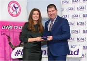 17 February 2024; Pictured at the Learn to Lead LGFA Female Leadership Programme graduation ceremony at The Bonnington Hotel in Dublin is Laura Redmond from Clongeen, Co Wexford, with Ladies Gaelic Football Association President, Mícheál Naughton. The Learn to Lead programme was devised to develop the next generation of leaders within Ladies Gaelic Football. Photo by Matt Browne/Sportsfile