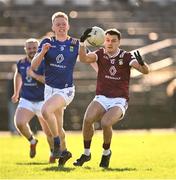 18 February 2024; David Lynch of Westmeath in action against Craig Maguire of Wicklow during the Allianz Football League Division 3 match between Wicklow and Westmeath at Echelon Park in Aughrim, Wicklow. Photo by Ray McManus/Sportsfile