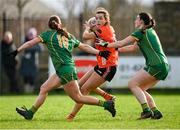 18 February 2024; Aimee Mackin of Armagh in action against Meath players Ciara Lawlor, left, and Shelly Melia during the Lidl LGFA National League Division 1 Round 4 match between Meath and Armagh at Donaghmore Ashbourne GAA Club in Ashbourne, Meath. Photo by Seb Daly/Sportsfile