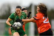 18 February 2024; Niamh Gallogly of Meath in action against Corinna Doyle of Armagh during the Lidl LGFA National League Division 1 Round 4 match between Meath and Armagh at Donaghmore Ashbourne GAA Club in Ashbourne, Meath. Photo by Seb Daly/Sportsfile