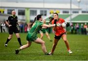 18 February 2024; Corinna Doyle of Armagh in action against Shelly Melia of Meath during the Lidl LGFA National League Division 1 Round 4 match between Meath and Armagh at Donaghmore Ashbourne GAA Club in Ashbourne, Meath. Photo by Seb Daly/Sportsfile