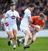 18 February 2024; Conor Turbitt of Armagh in action against Niall Kelly of Armagh during the Allianz Football League Division 2 match between Kildare and Armagh at Netwatch Cullen Park in Carlow. Photo by Piaras Ó Mídheach/Sportsfile