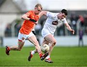 18 February 2024; Cian McConville of Armagh in action against Alex Beirne of Kildare during the Allianz Football League Division 2 match between Kildare and Armagh at Netwatch Cullen Park in Carlow. Photo by Piaras Ó Mídheach/Sportsfile