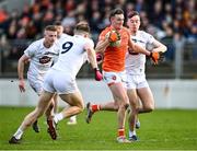 18 February 2024; Connaire Mackin of Armagh in action against Paddy McDermott, right, of Kildare during the Allianz Football League Division 2 match between Kildare and Armagh at Netwatch Cullen Park in Carlow. Photo by Piaras Ó Mídheach/Sportsfile