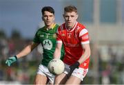 18 February 2024; Peter Lynch of Louth and Ciaran Caulfield of Meath during the Allianz Football League Division 2 match between Meath and Louth at Páirc Tailteann in Navan, Meath. Photo by Shauna Clinton/Sportsfile