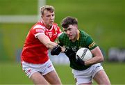 18 February 2024; Jack O'Connor of Meath and Paul Mathews of Louth during the Allianz Football League Division 2 match between Meath and Louth at Páirc Tailteann in Navan, Meath. Photo by Ben McShane/Sportsfile