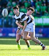 20 February 2024; Andre Ryan of Belvedere College is tackled by Sean Heneghan of Gonzaga College during the Bank of Ireland Leinster Schools Senior Cup quarter-final match between Gonzaga College and Belvedere College at Energia Park in Dublin. Photo by Tyler Miller/Sportsfile