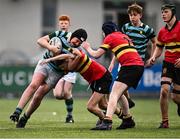 9 February 2024; Brodie McNeill of St Gerard's School is tackled by Vinny Hazel of CBC Monkstown during Bank of Ireland Leinster Schools Junior Cup Round 1 match between CBC Monkstown and St Gerard's School at Energia Park in Dublin. Photo by Piaras Ó Mídheach/Sportsfile