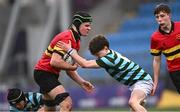 9 February 2024; James Lambert of CBC Monkstown in action against Brodie McNeill of St Gerard's School during Bank of Ireland Leinster Schools Junior Cup Round 1 match between CBC Monkstown and St Gerard's School at Energia Park in Dublin. Photo by Piaras Ó Mídheach/Sportsfile