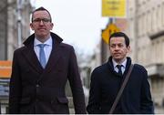 22 February 2024; FAI finance director Dan McCormack, right, and FAI chief operating officer David Courell, left, arrive at Dáil Éireann in Dublin ahead of a meeting with the Committee of Public Accounts. Photo by Seb Daly/Sportsfile