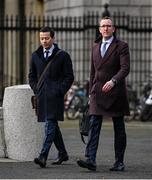 22 February 2024; FAI finance director Dan McCormack, left, and FAI chief operating officer David Courell arrive at Dáil Éireann in Dublin ahead of a meeting with the Committee of Public Accounts. Photo by Seb Daly/Sportsfile