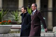 22 February 2024; FAI finance director Dan McCormack, left, and FAI chief operating officer David Courell arrive at Dáil Éireann in Dublin ahead of a meeting with the Committee of Public Accounts. Photo by Seb Daly/Sportsfile