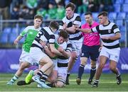 20 February 2024; Sean Heneghan of Gonzaga College is tackled by Dylan Lord, left, and Cillian McCann of Belvedere College during the Bank of Ireland Leinster Schools Senior Cup quarter-final match between Gonzaga College and Belvedere College at Energia Park in Dublin. Photo by Tyler Miller/Sportsfile