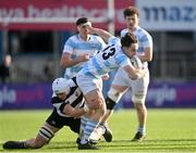 22 February 2024; Derry Moloney of Blackrock College is tackled by Joe Finn of Cistercian College Roscrea during the Bank of Ireland Leinster Schools Senior Cup quarter-final match between Cistercian College, Roscrea and Blackrock College at Energia Park in Dublin. Photo by Sam Barnes/Sportsfile