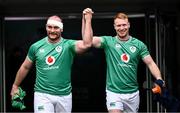 23 February 2024; Oli Jager and Ciarán Frawley walk out during an Ireland rugby captain's run at the Aviva Stadium in Dublin. Photo by Harry Murphy/Sportsfile