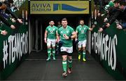 23 February 2024; Ireland captain Peter O’Mahony leads the team out for a Ireland rugby captain's run at the Aviva Stadium in Dublin. Photo by Harry Murphy/Sportsfile