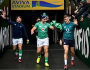 23 February 2024; Ireland players, from right, Garry Ringrose, James Lowe and Jack Crowley walk out for an Ireland rugby captain's run at the Aviva Stadium in Dublin. Photo by Harry Murphy/Sportsfile