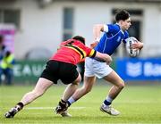 23 February 2024; Andrew Stronge of St Mary’s College is tackled by Christopher O’Toole of CBC Monkstown during the Bank of Ireland Leinster Schools Senior Cup quarter-final match between CBC Monkstown and St Mary's Collegee at Energia Park in Dublin. Photo by Daire Brennan/Sportsfile