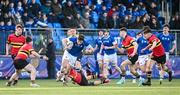 23 February 2024; Evan Moynihan of St Mary’s College is tackled by Milo Quinn of CBC Monkstown during the Bank of Ireland Leinster Schools Senior Cup quarter-final match between CBC Monkstown and St Mary's Collegee at Energia Park in Dublin. Photo by Daire Brennan/Sportsfile