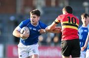 23 February 2024; Evan Moynihan of St Mary’s College is tackled by Conor Broderick of CBC Monkstown during the Bank of Ireland Leinster Schools Senior Cup quarter-final match between CBC Monkstown and St Mary's Collegee at Energia Park in Dublin. Photo by Daire Brennan/Sportsfile