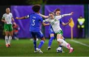 23 February 2024; Izzy Atkinson of Republic of Ireland is tackled by Benedetta Glionna of Italy, behind, during the international women's friendly match between Italy and Republic of Ireland at Viola Park in Florence, Italy. Photo by David Fitzgerald/Sportsfile