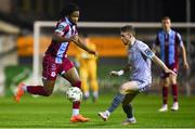 23 February 2024; Zishim Bawa of Drogheda United in action against Darragh Power of Waterford during the SSE Airtricity Men's Premier Division match between Drogheda United and Waterford at Weavers Park in Drogheda, Louth. Photo by Tyler Miller/Sportsfile