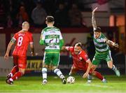 23 February 2024; Paddy Barrett of Shelbourne goes down under pressure from Lee Grace of Shamrock Rovers, resulting in a penalty, during the SSE Airtricity Men's Premier Division match between Shelbourne and Shamrock Rovers at Tolka Park in Dublin. Photo by Stephen McCarthy/Sportsfile