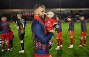 23 February 2024; Paddy Barrett of Shelbourne and his son Beau before the SSE Airtricity Men's Premier Division match between Shelbourne and Shamrock Rovers at Tolka Park in Dublin. Photo by Stephen McCarthy/Sportsfile