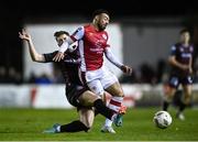 23 February 2024; Jake Mulraney of St Patrick's Athletic is tackled by Cian Byrne of Bohemiansduring the SSE Airtricity Men's Premier Division match between St Patrick's Athletic and Bohemians at Richmond Park in Dublin. Photo by Harry Murphy/Sportsfile