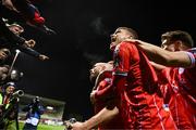 23 February 2024; Mark Coyle of Shelbourne celebrates with team-mate, inlcuding Sean Gannon, second from right, after scoring their side's first goal during the SSE Airtricity Men's Premier Division match between Shelbourne and Shamrock Rovers at Tolka Park in Dublin. Photo by Stephen McCarthy/Sportsfile