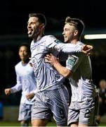 23 February 2024; Pádraig Amond of Waterford, left, celebrates with team-mate Darragh Power after scoring their side's fourth goal during the SSE Airtricity Men's Premier Division match between Drogheda United and Waterford at Weavers Park in Drogheda, Louth. Photo by Tyler Miller/Sportsfile