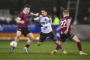 23 February 2024; Sam Durrant of Dundalk in action against Edward McCarthy, left, and Conor McCormack of Galway United during the SSE Airtricity Men's Premier Division match between Dundalk and Galway United at Oriel Park in Dundalk, Louth. Photo by Ben McShane/Sportsfile