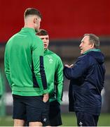 23 February 2024; Ireland head coach Richie Murphy speaks to captain Evan O’Connell, left, and outhalf Jack Murphy before the U20 Six Nations Rugby Championship match between Ireland and Wales at Virgin Media Park in Cork. Photo by Brendan Moran/Sportsfile